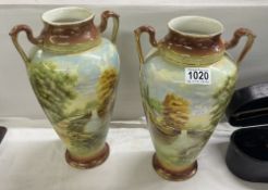 A pair of early Victorian floral vases.
