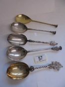 Five early spoons with finials.