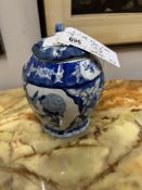 A vintage chinoiserie Chinese blue & white ginger jar with finely painted floral motifs and panels