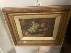 A still life on board painting with grapes