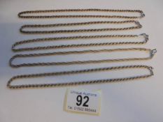 Five silver neck chains, 45 grams.