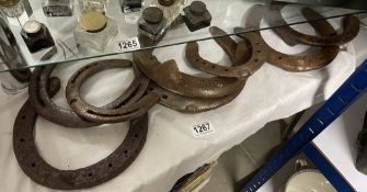 A quantity of horse shoes