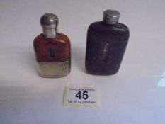 Two early 20th century hip flasks.