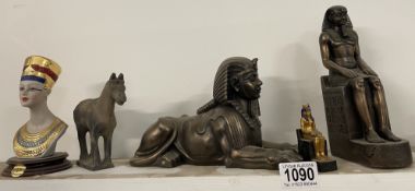 A quantity of heavy Egyptian figures