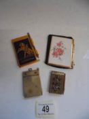 Four assorted notebooks with pencils.