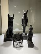 A quantity of black Egyptian figures