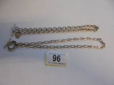 Two silver neck chains, 77 grams.