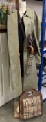 A quantity of Burberry related items including trench coat, bag, purse & umbrella