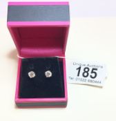 A pair of 14ct white gold diamond stud earrings of 1.4cts approximately