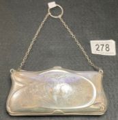 A George V silver purse, Art Nouveau shaped design, engraved with the monogram L with a heart.