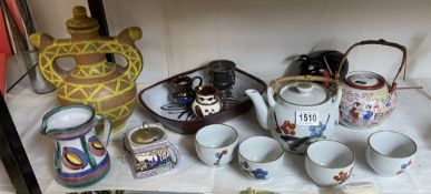 A mixed lot including Tintagel pottery jug, Japanese teapots and cups.