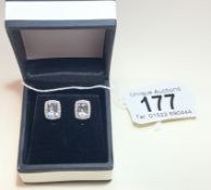 A pair of 18ct white gold aquamarine & diamond earrings