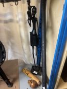 A vintage tribal blowpipe with combined quiver poison pot and a carved tribal figure.