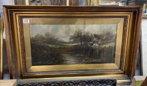A framed & glazed oil painting of a landscape with a pond & cottage signed H Taylor