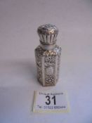 A silver scent bottle complete with stopper, maker W. P. Birmingham.