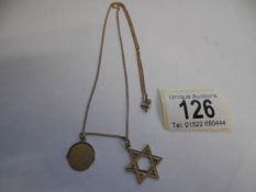 A 9ct gold double pendant with Star of David. 5.5 grams.