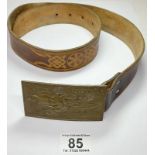 Rare Pirelli belt buckle, Salvador Dali 1904 - 1989, British circa 1970, brass unnumbered, front