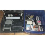 A ZX Spectrum in fitted wooden box with cassette recorder with a box of assorted games & a