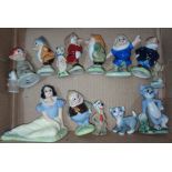 A collection of Wade Disney figures including Snow White.