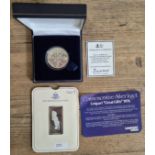 An 1887 silver double florin in presentation box & a hallmarked silver 31g ingot.