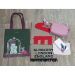 A mixed lot comprising a Burberry wool scarf, a Joules pink leather bag, a Ted Baker purse and a
