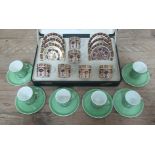 A set of of six hallmarked silver coffee can holders with Shelley cups and saucers, together with