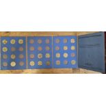 A Whitman coin folder containing variuos florins dated 1920 to 1946.