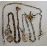 Two hallmarked silver watch chains; one with a white metal fob, T bar and watch keys, together