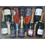 Nine bottles of assorted sparkling wine.