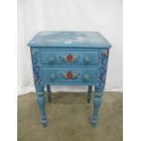 Painted hardwood bedside table having moulded edge top over two drawers with turned knob handles,