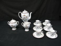 Wedgwood Kutani Crane pattern coffee service to comprise: coffee pot, lidded two handled sugar bowl,