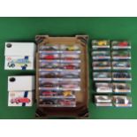 Box of twenty six 1:43 scale 1990's boxed diecast model cars and vans made by Matchbox under the