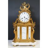 19th century gilt metal mantle clock with putti cherub and garland finial design, enameled dial,