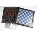 The Franklin Mint 'Battle of Waterloo' Chess Set, having fitted box with chess board, all pieces