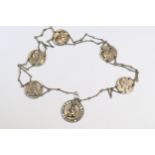 Early 20th century Shakespeare medallion and coin chain belt, the central pendant with pierced