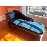 A good Victorian chaise lounge with carved mahogany end