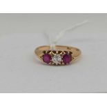 A DIAMOND AND RUBY RING 18CT GOLD SIZE R 3.5 GMS