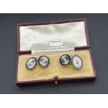 Antique CARTIER 18ct gold and platinum oval blue enamelled cufflinks, each cufflink set with a
