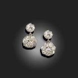 A PAIR OF DIAMOND EARRINGS, each with a cluster of old circular-cut diamonds suspended below a