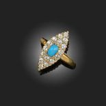 AN EARLY 20TH CENTURY TURQUOISE AND DIAMOND RING, of navette-shaped design, set with a cabochon