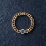 A VICTORIAN SAPPHIRE AND DIAMOND BRACELET, the oval cabochon sapphire weighing 3.414cts set within a