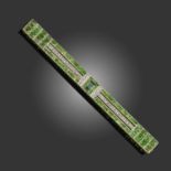 AN EARLY 20TH CENTURY DEMANTOID GARNET AND DIAMOND BROOCH, set with a central step-cut garnet within