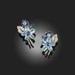 CARTIER, A PAIR OF AQUAMARINE, SAPPHIRE AND DIAMOND EAR CLIPS, each composed of two flowerheads