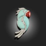 λ A CORAL, TURQUOISE AND DIAMOND BROOCH, designed as a parrot, with a coral beak and carved