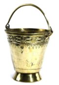 A RARE BRASS PAIL C.1680 with rolled swing handle, the tapering drum with a bold band of geometric