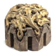 A RARE GILT OAK ROOF BOSS EAST ANGLIA, MID-15TH CENTURY decorated with scrolling leaves 24cm high,