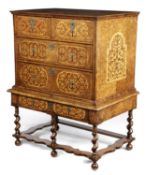 A WILLIAM AND MARY WALNUT AND MARQUETRY CHEST ON STAND C.1690 inlaid with stringing and crossbanding