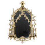 A GEORGE III GILTWOOD WALL MIRROR POSSIBLY IRISH, C.1780 in the Gothic style, the arched plate