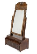 A QUEEN ANNE WALNUT TOILET MIRROR EARLY 18TH CENTURY the arched bevelled apparently original plate
