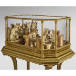 A RARE LATE VICTORIAN TAXIDERMY RED SQUIRREL TEA PARTY ATTRIBUTED TO WALTER POTTER (1835-1918), C.